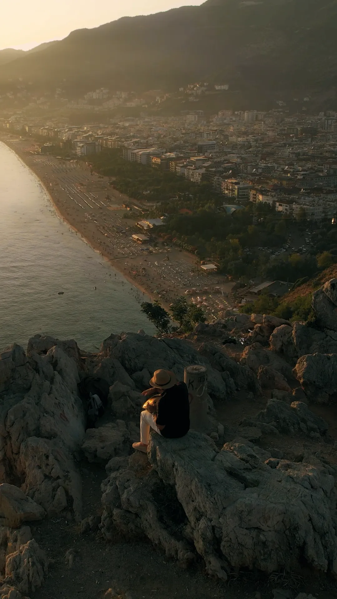 Sunset view from above Alanya peninsula with golden hour light